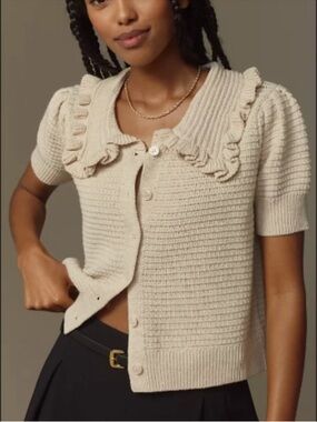 The Ainsley Ruffle-Collar Cardigan
Sweater: Short-Sleeve Edition size large EUC